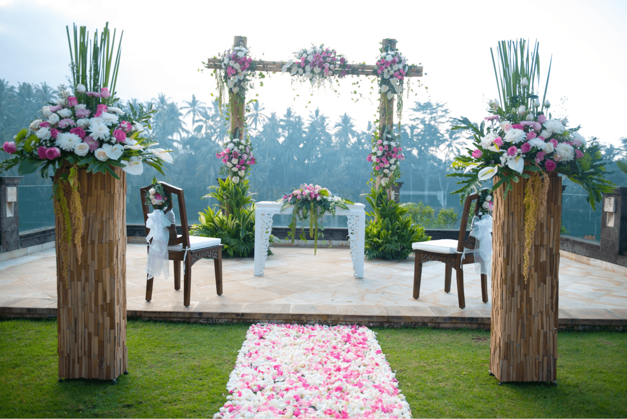 An elegant wedding alter decorated with flowers in Bali