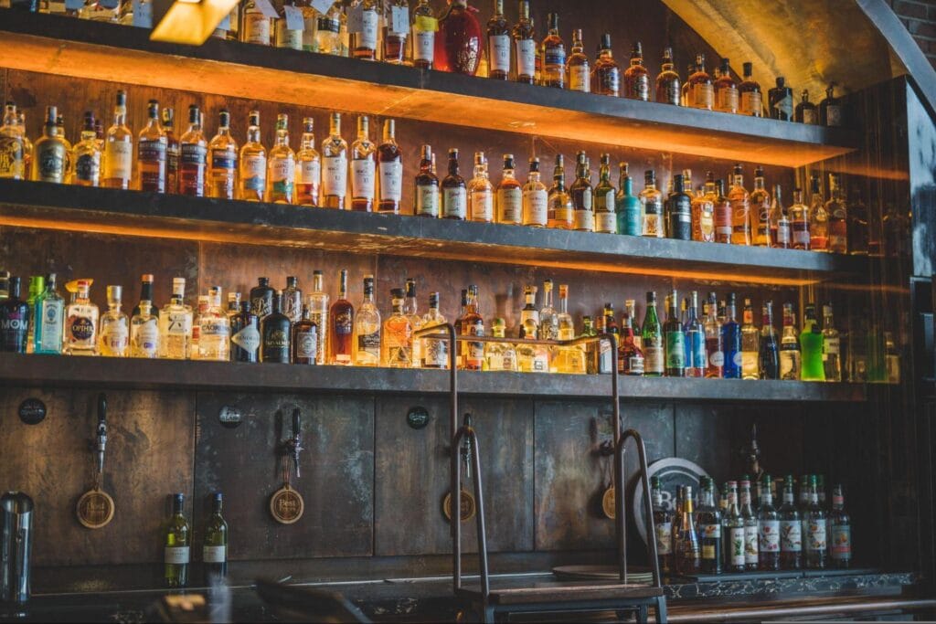 A selection of spirits in a retro looking bar