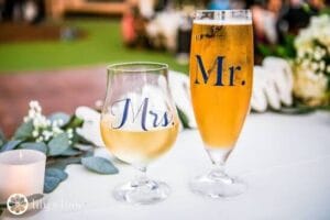 Mr and mrs drinks at a wedding