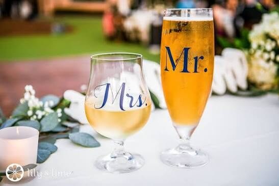 Mr and mrs drinks at a wedding