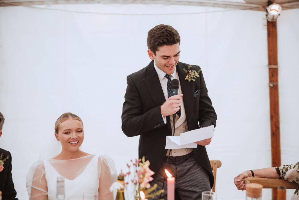 A groom at a wedding giving a speech