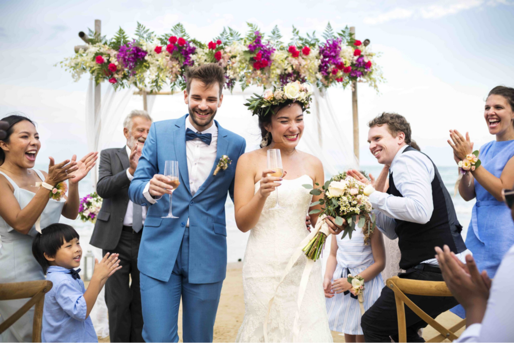 A couple toasting champagne at a wedding